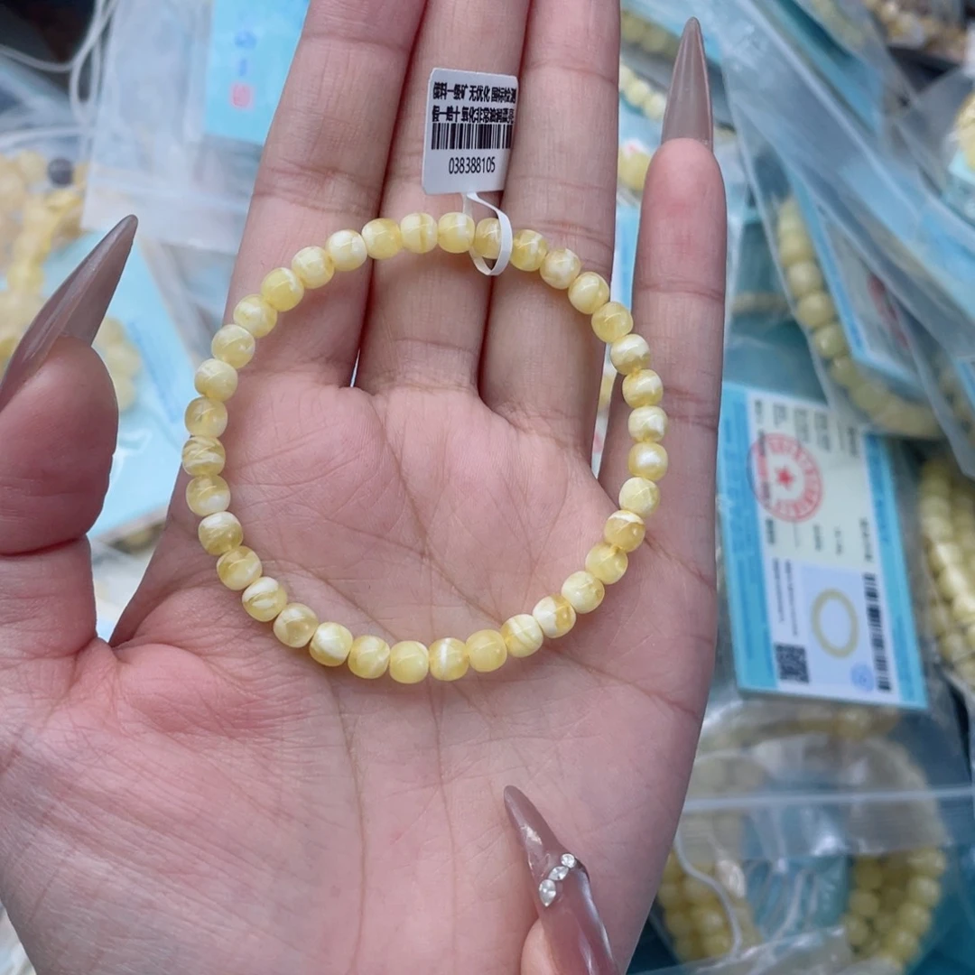 蜜蜡裸石未镶嵌周****》蜜蜡34