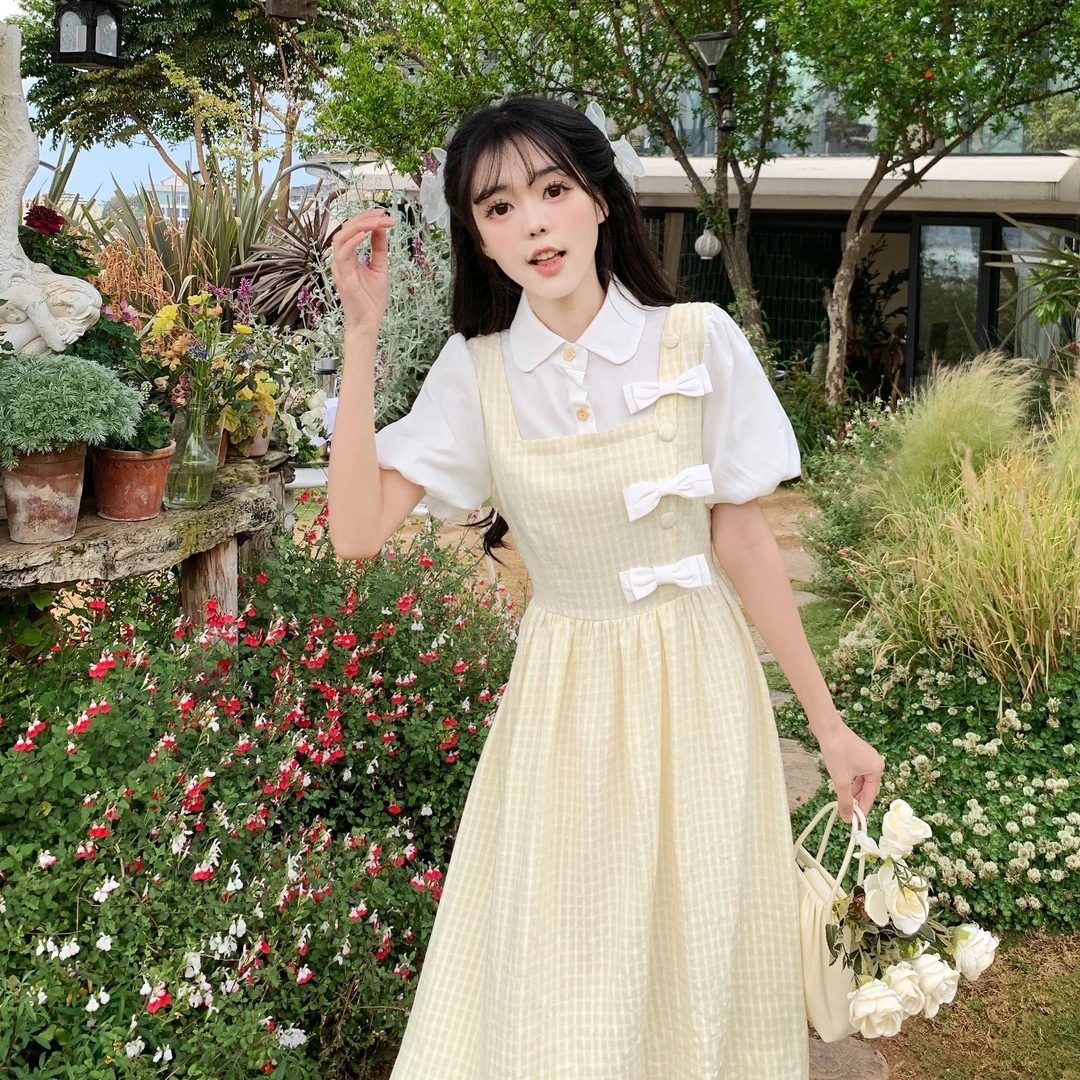 甜美减龄森系短袖连衣裙女2025夏季韩版少女假两件黄色格纹长裙子