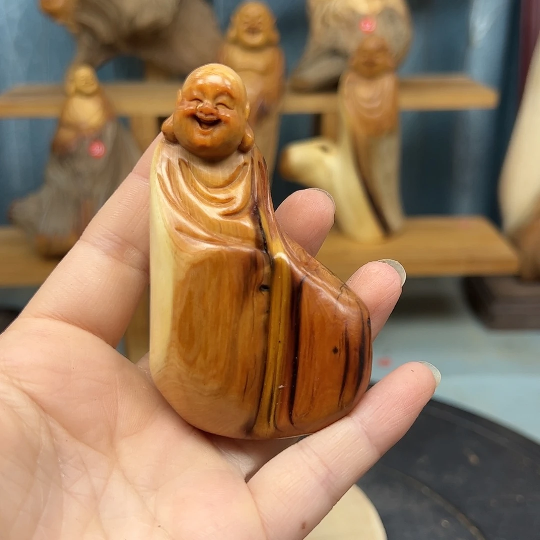 木真****你崖柏木摆件手把件