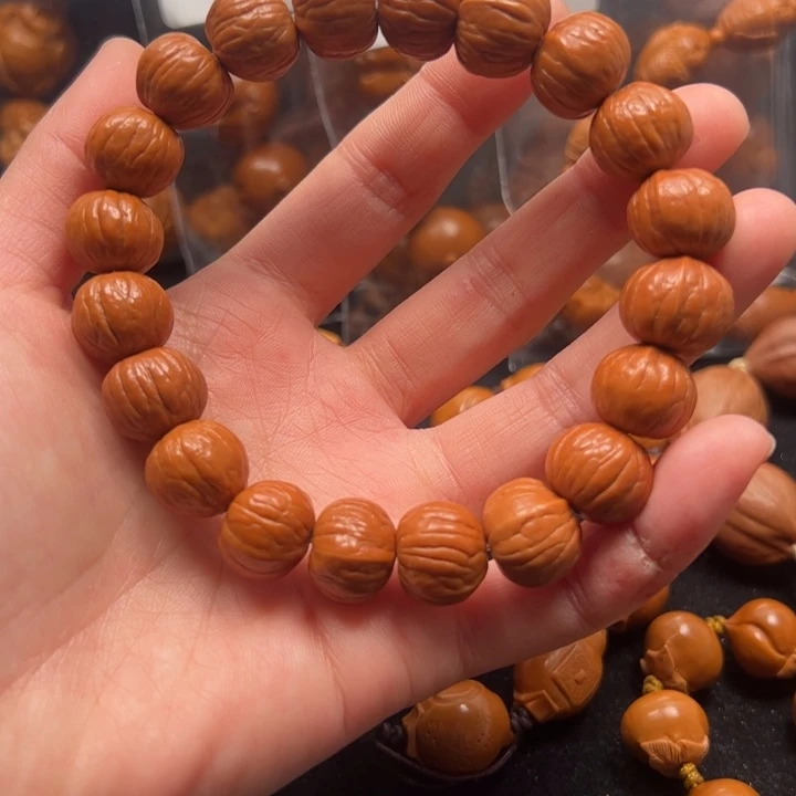 橄榄核吊坠猴头串