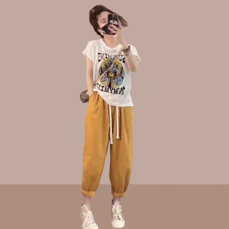 气质高级感套装女2025夏季新款舒适百搭个性图案T恤束脚裤两件套