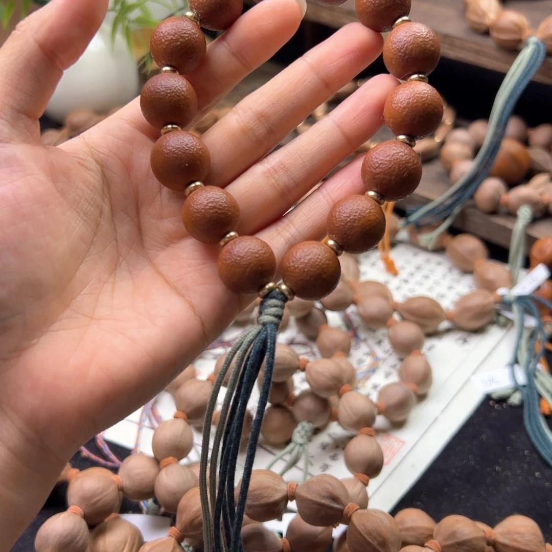 手串橄榄核婷***睿020。1.6橘子纹