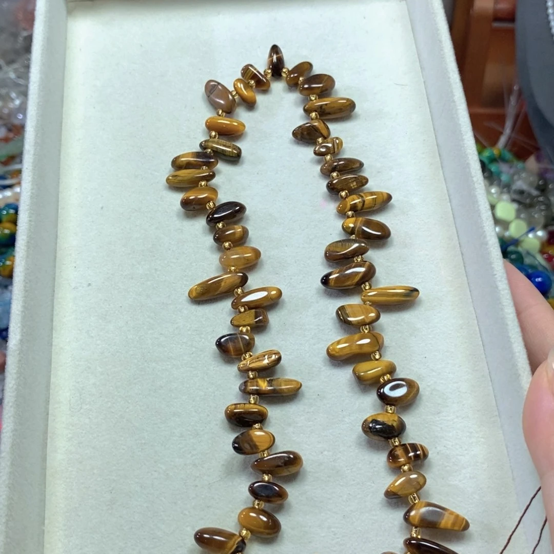 玛瑙/玉髓合金珠宝半成品虎眼长牙一条