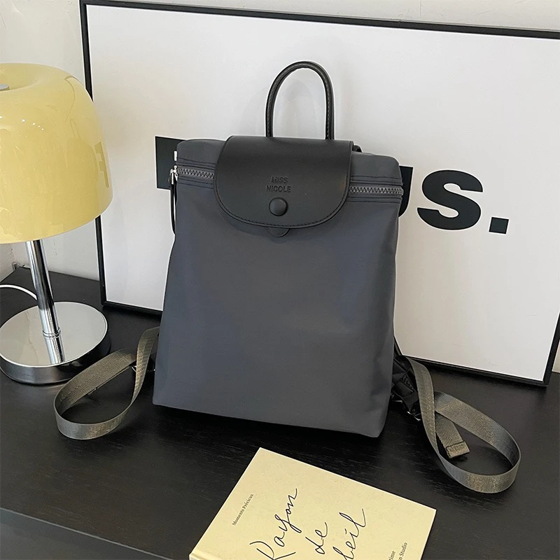 自留款优质超轻便防水旅游通用双肩包黑色