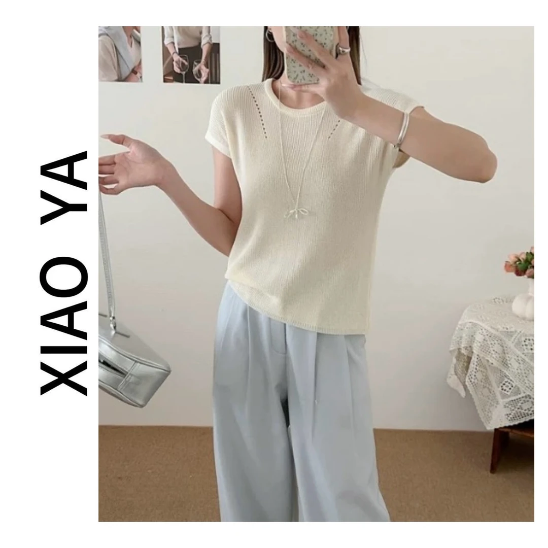 9605夏季新款气质圆领设计感镂空显瘦百搭针织上衣