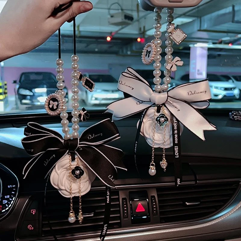 汽车挂件平安挂饰2025新款高级吊坠网红女扩香石山茶花香薰车载挂