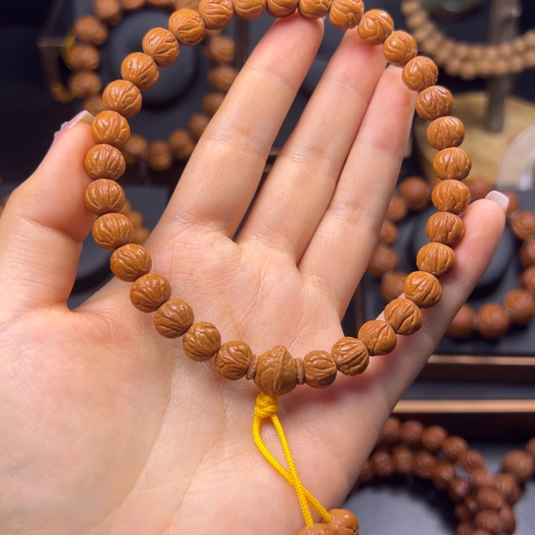 卡***妈桃核手串野生玉龙脊0.9