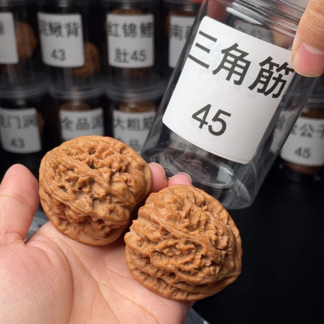 小***儿文玩核桃把件45三角粗筋