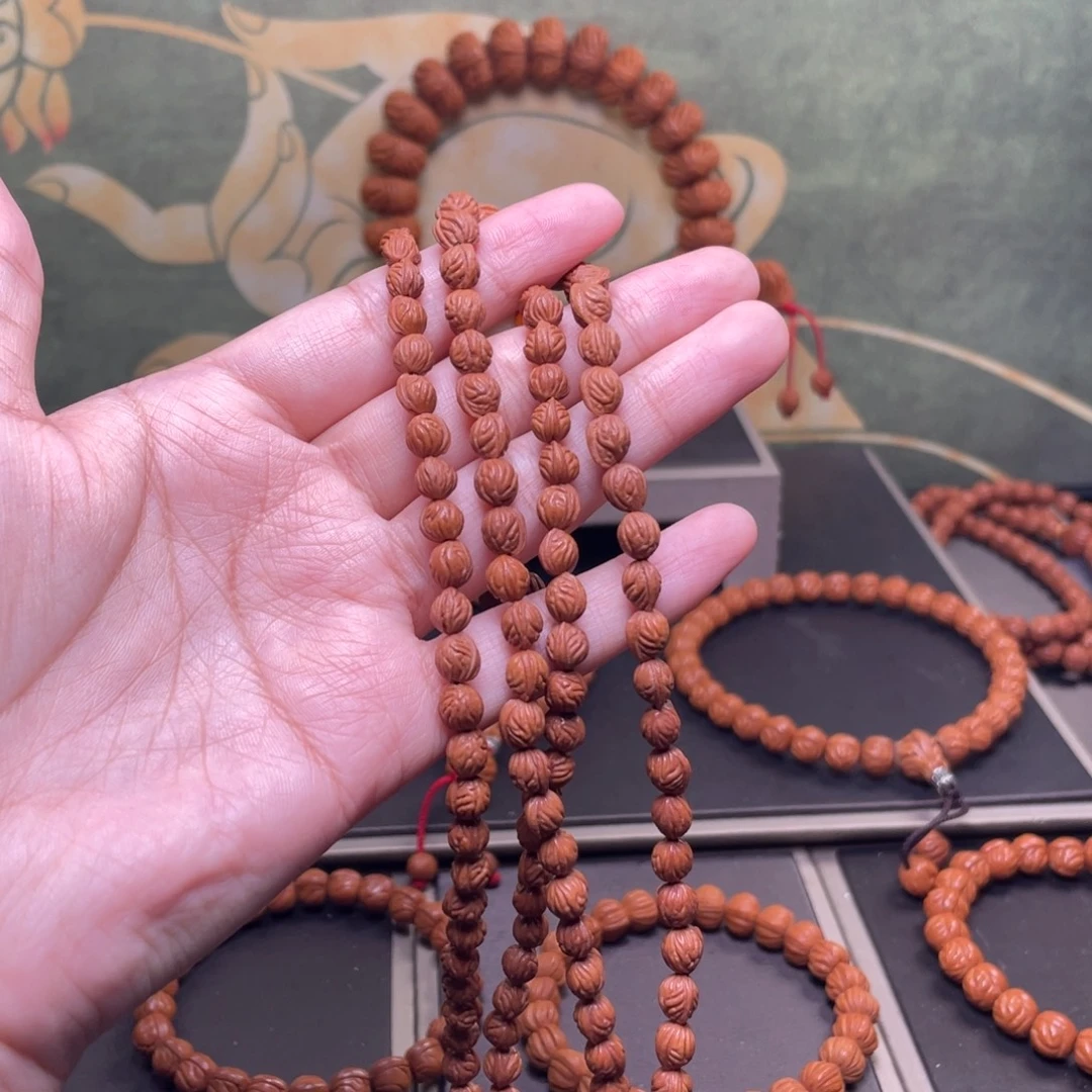 戏***。桃核吊坠108脖挂0.65