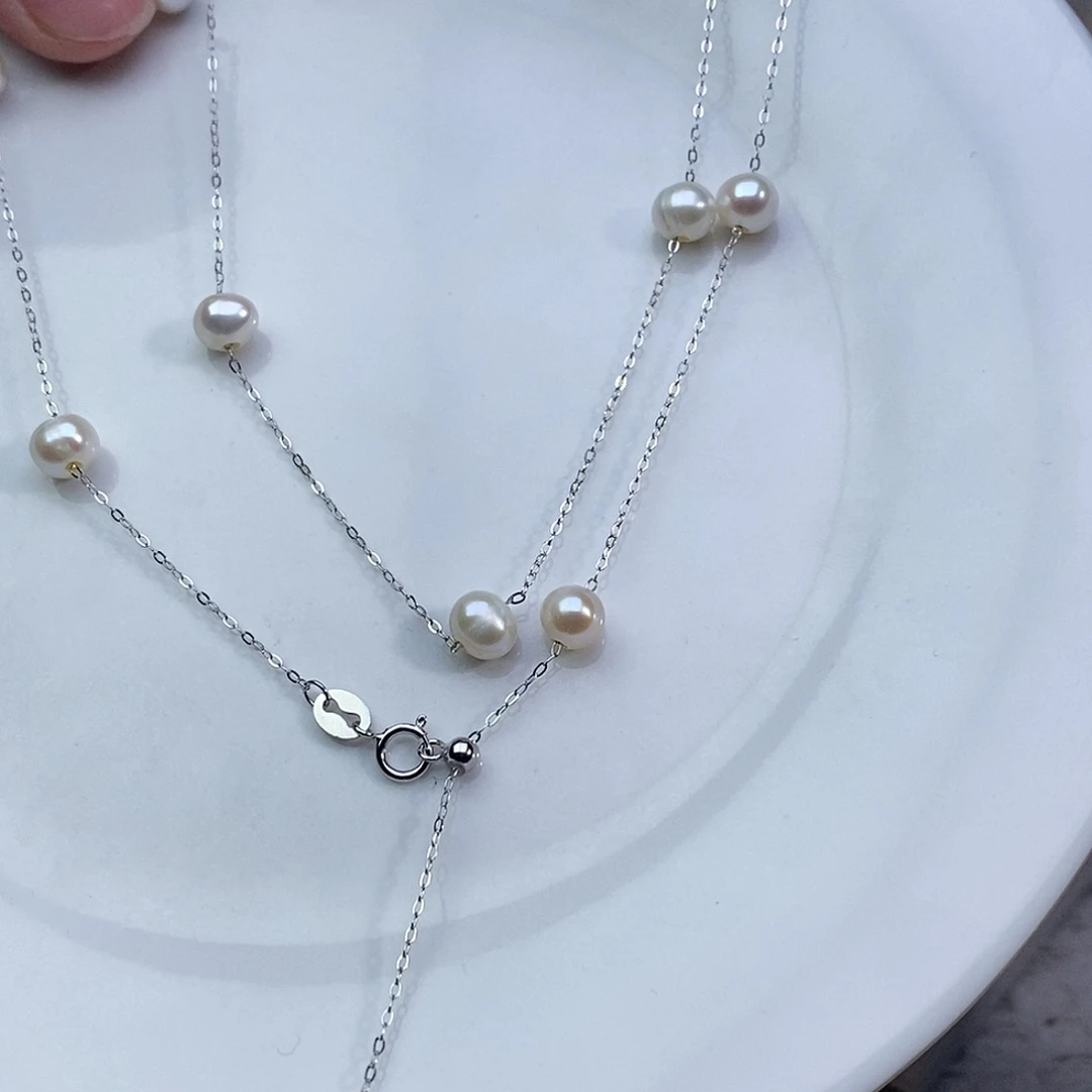 淡水珍珠银S925镶嵌耳饰