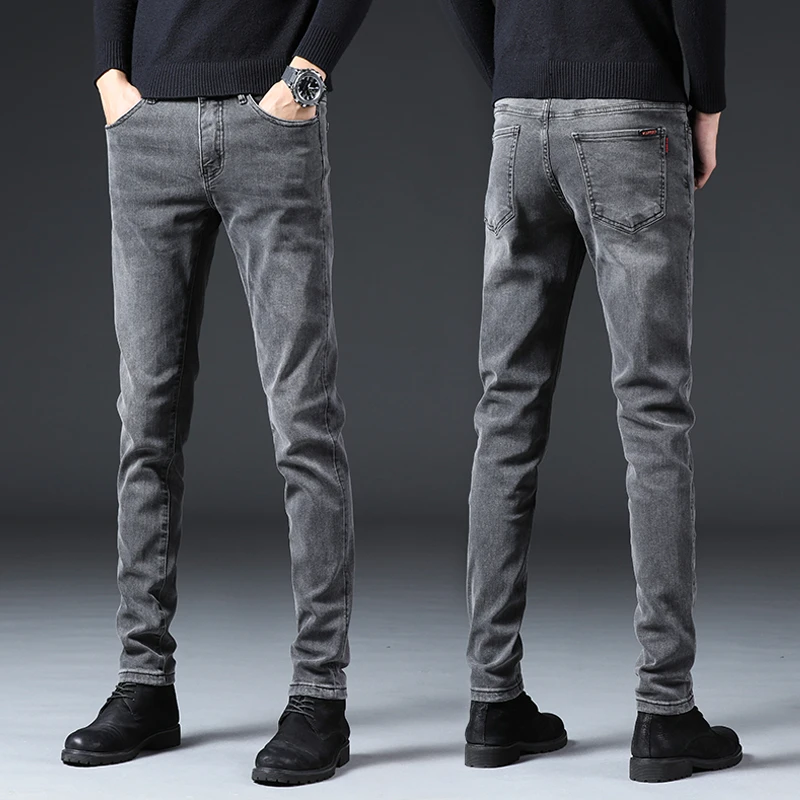 香港高端牛仔裤男士修身小脚弹力2025秋冬季新款潮牌烟灰色长裤子