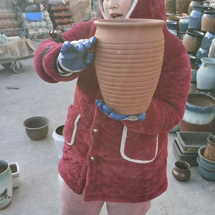 红陶口20高27瑕疵底裂