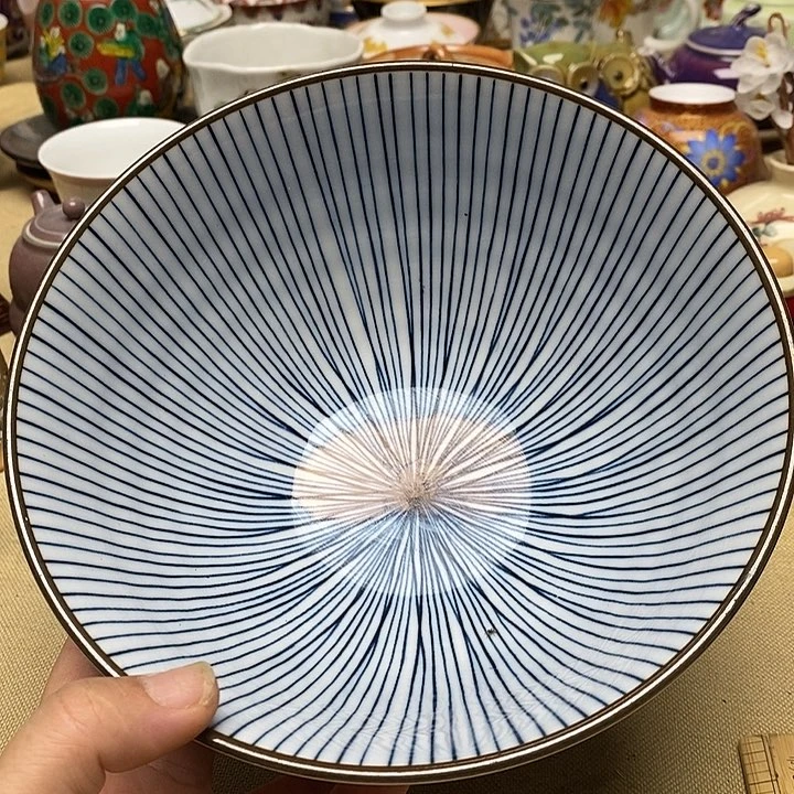 紫砂茶宠杯子的味道就好像被风雨浸