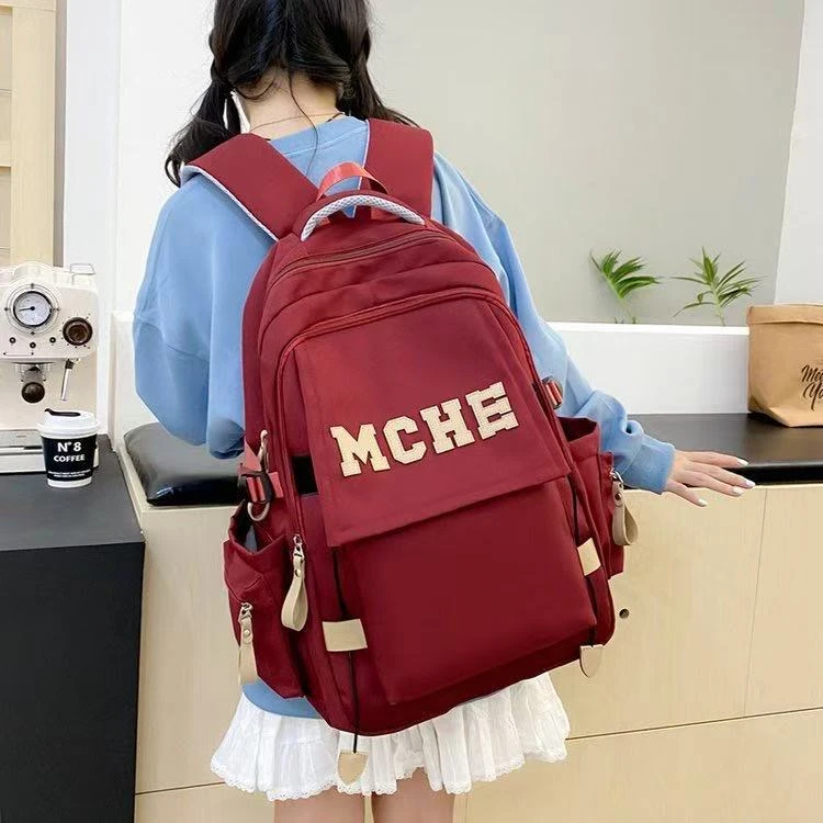 初高中学生书包大容量双肩背包简约字母翻盖学生背包五六年级书包