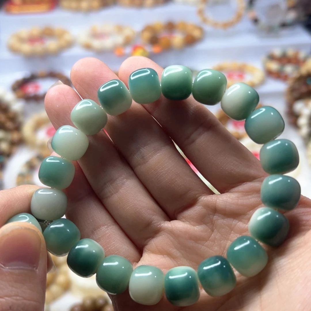 菩提根/象牙果手串做****累飘花