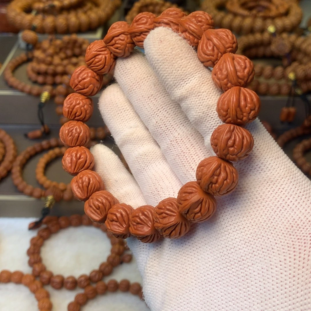 敬***1桃核手串秦岭龙纹