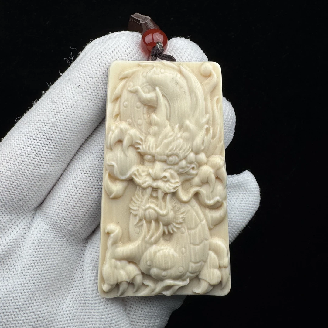 E3412天然猛犸牙瑕疵 雕刻牌37X68X10mm 支持鉴定 假一罚四