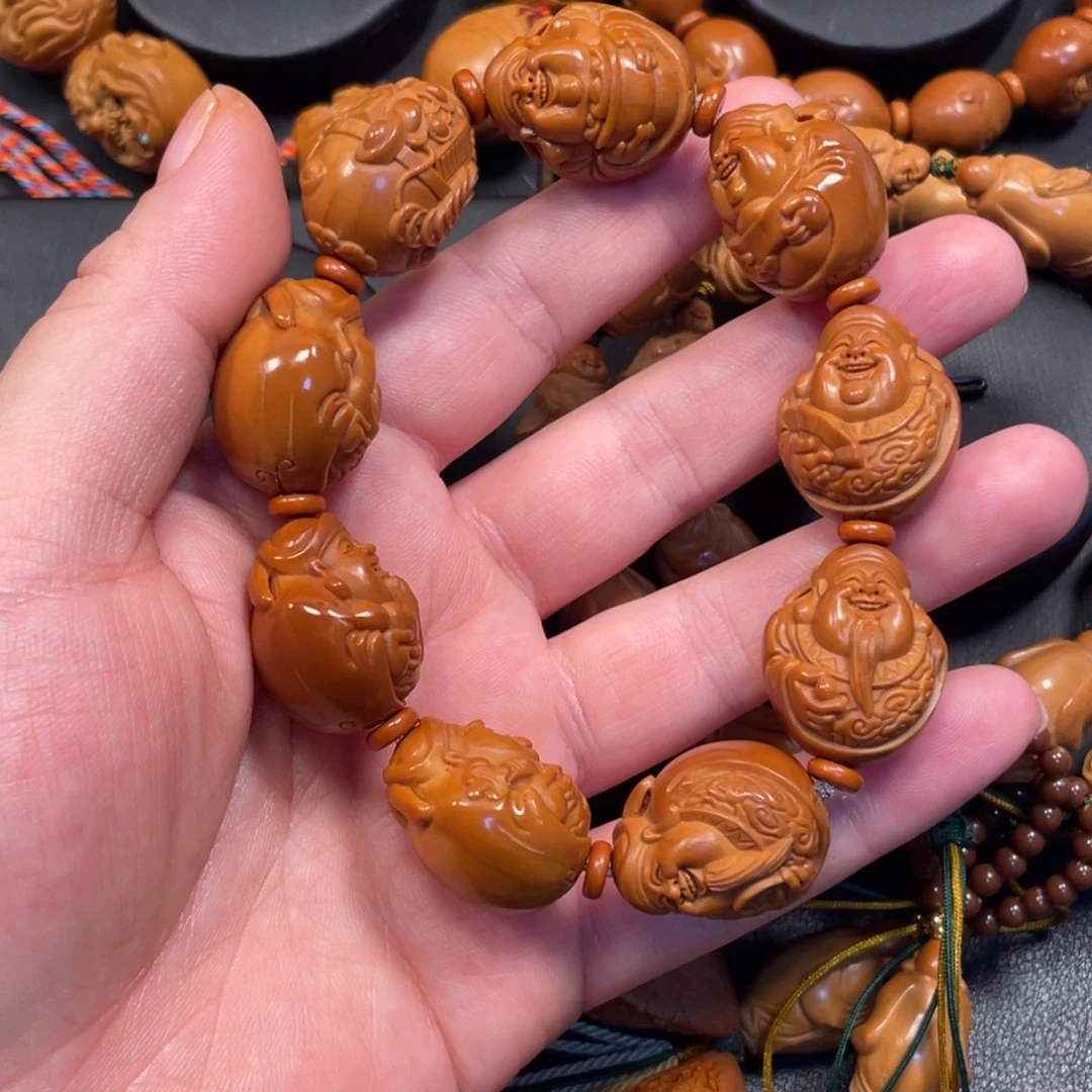 ****雪橄榄核手串/手链光背财神