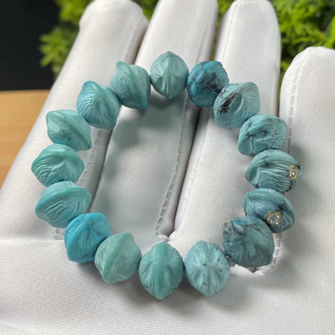 原矿绿松石雾霾蓝百香籽手串。尺寸12mm左右，重23.18g，圈围12cm