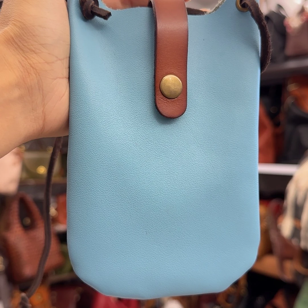 头层牛皮手机包特价