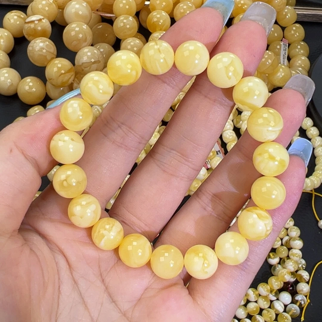 琥珀未镶嵌手链11.3黄白妖花