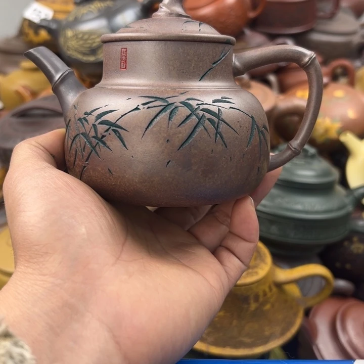 紫砂茶壶嘴巴毛边