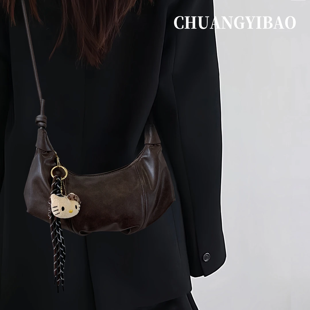 精致通勤可颂牛角包包女式2025新款秋冬轻奢小众高级感斜挎饺子包