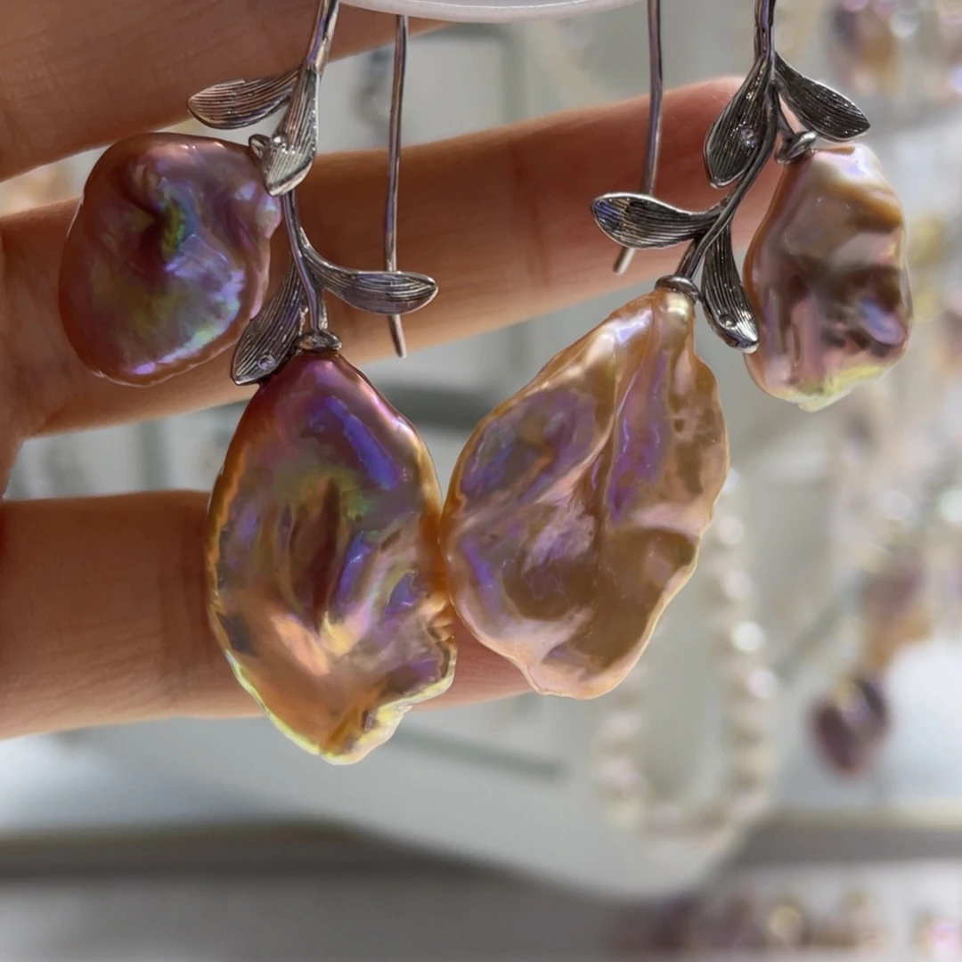 银S925镶嵌淡水珍珠耳饰杨****3