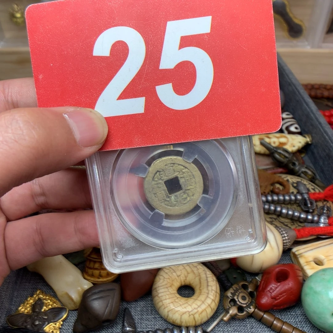 桃核吊坠来**回………………………………