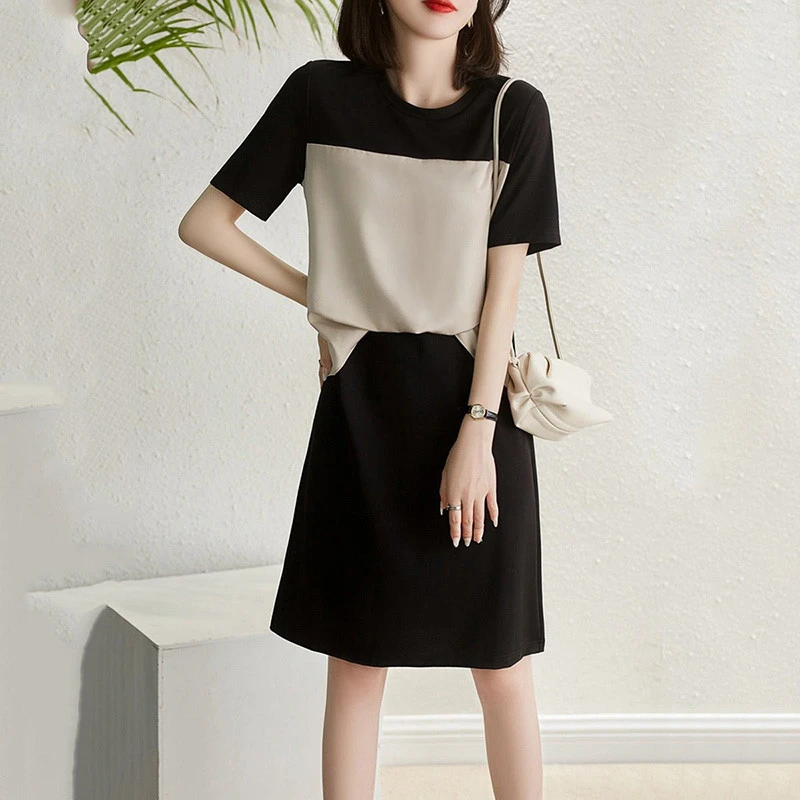 复古圆领连衣裙女2025夏季新款时尚设计感法式拼接显瘦气质中长裙