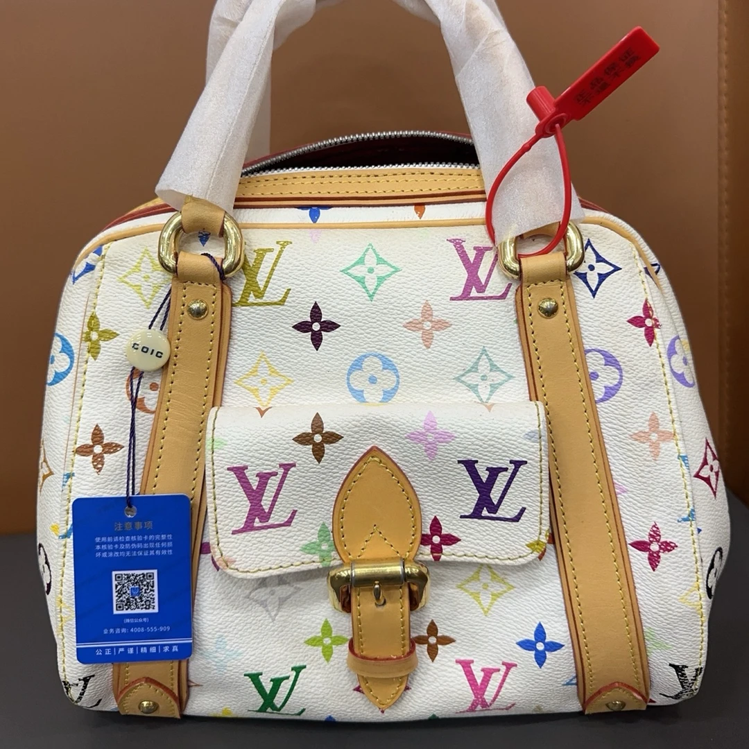 修复品白三彩元宝,保龄球,手提包