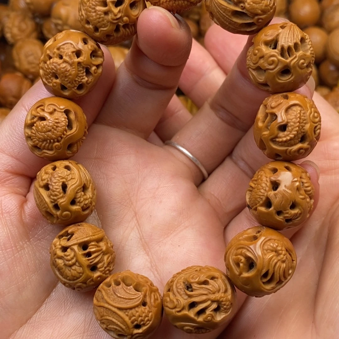 橄榄核手串镂空龙