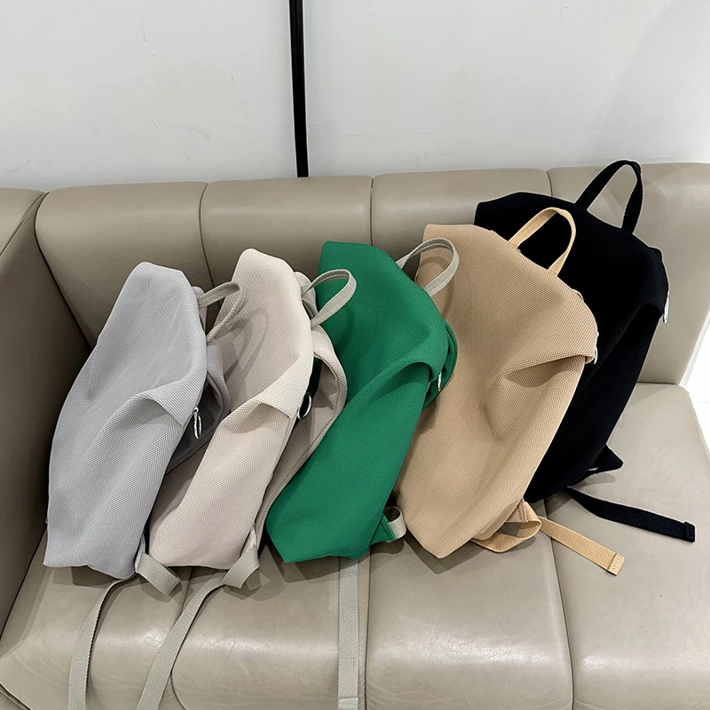 双肩包轻便大容量2025新款休闲百搭背包时尚空气感通勤运动背包