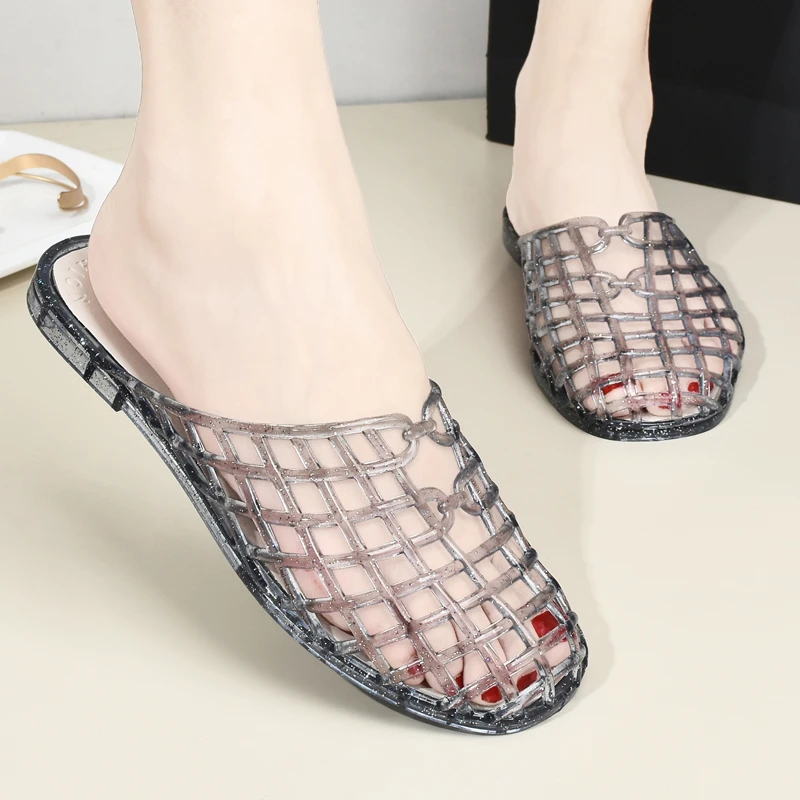 时尚夏季新款小众镂空透气防滑包头平底一脚蹬果冻鞋超轻凉拖鞋