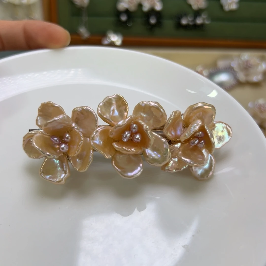非金属香槟色三花弹力夹
