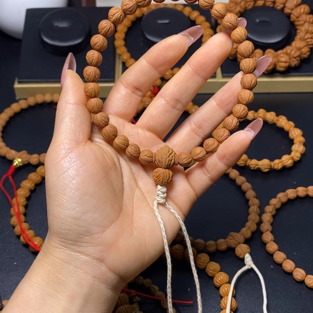 N***g桃核吊坠秦岭文玩