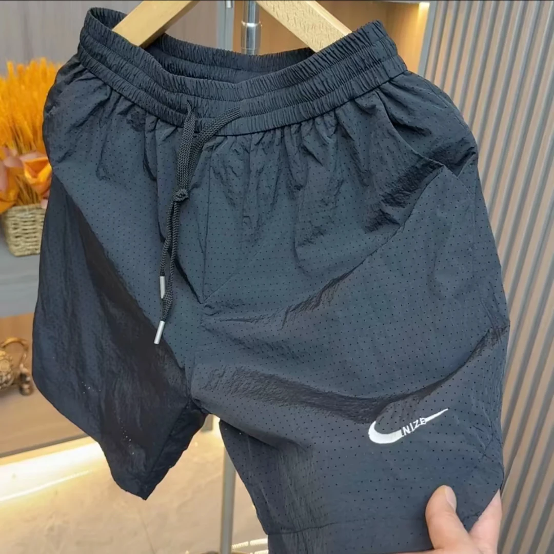 夏季新款时尚百搭激光打孔透气短裤不挑人99-22