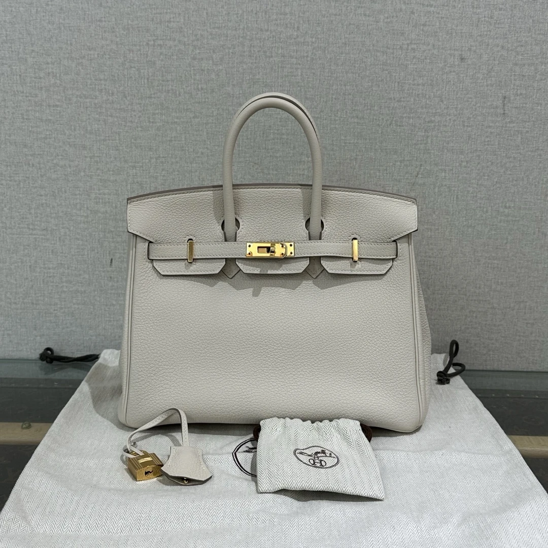 95新 Hermes/爱马仕 Birkin25奶昔白黄金扣手提 04184