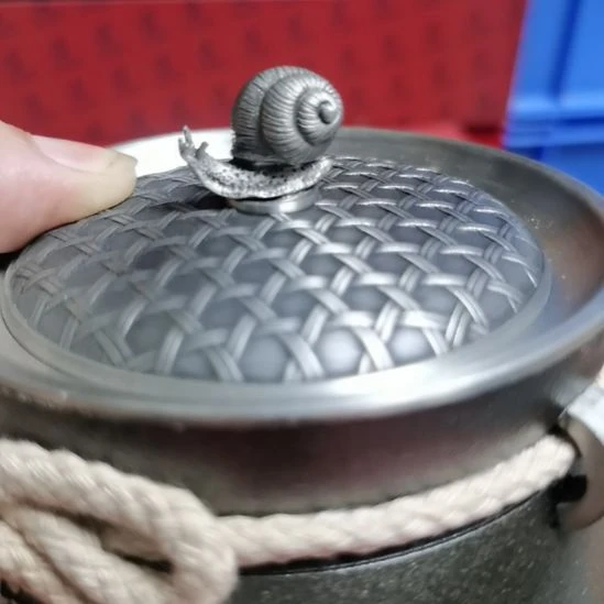 牵***奔蜗牛纯锡茶叶罐一个