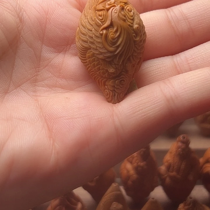 淡***定橄榄核吊坠橄榄核
