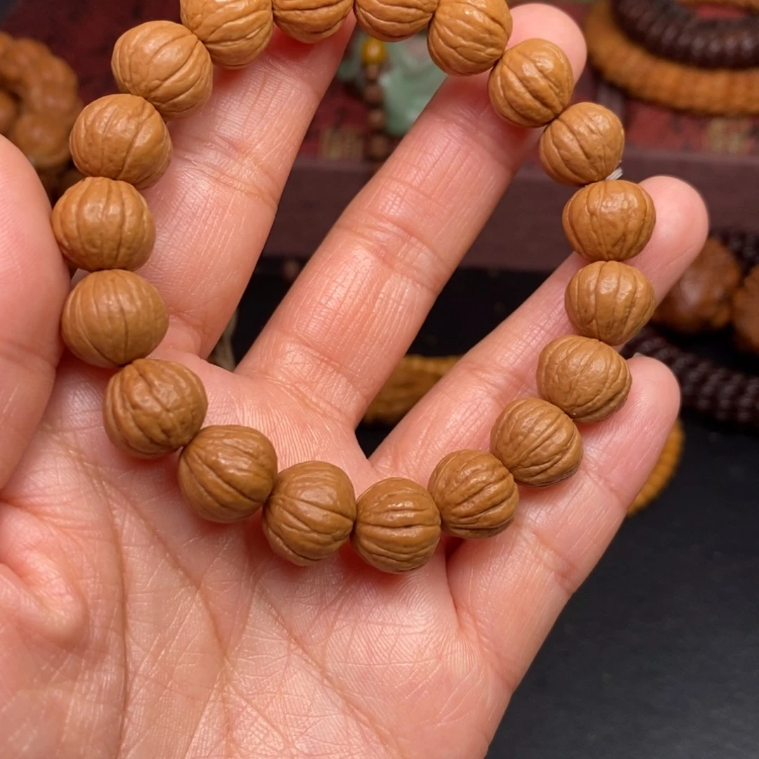 丁***丁猴头核桃吊坠橄榄猴头