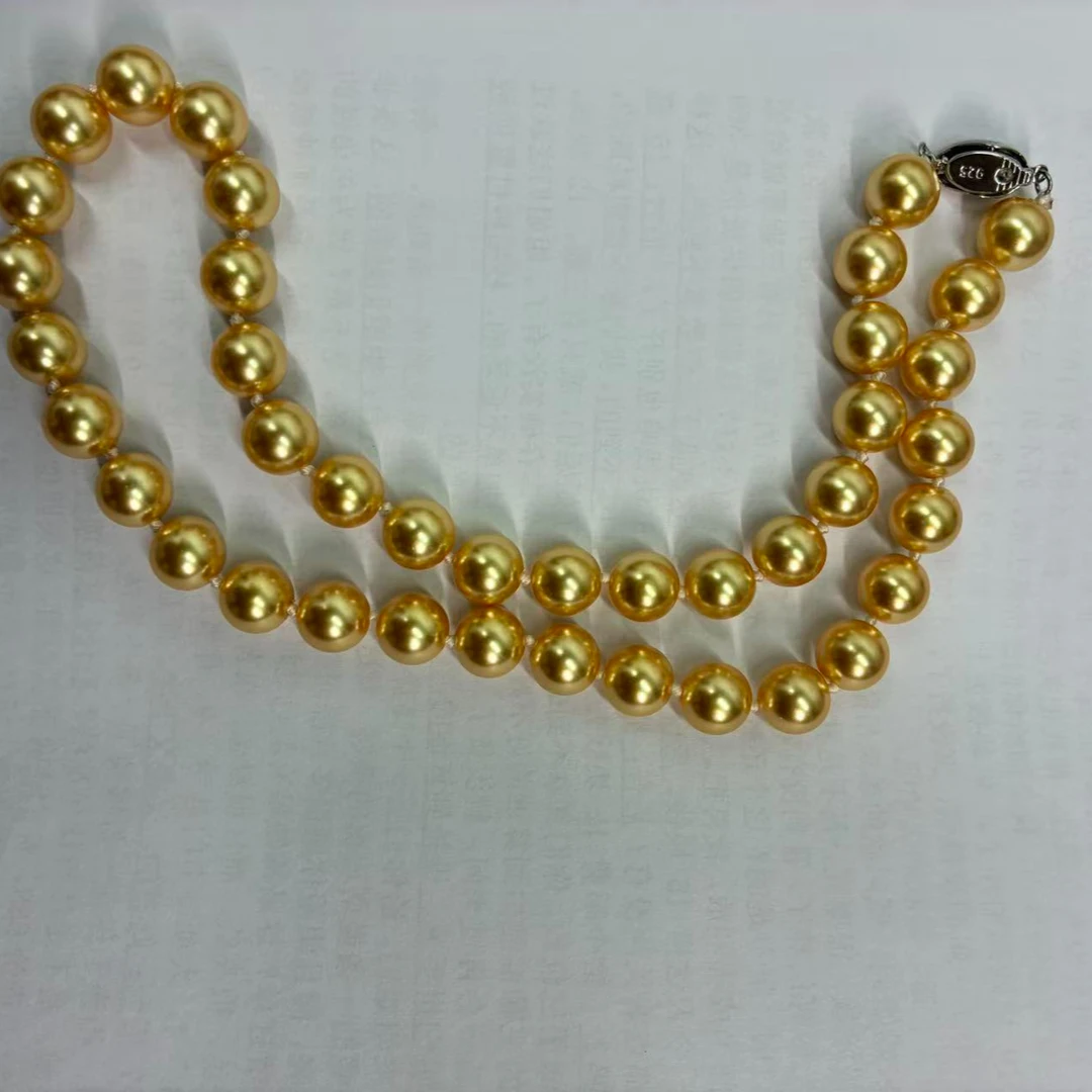 仿珍珠手链 10-11mm金色弹力绳贝珠手链SLA107