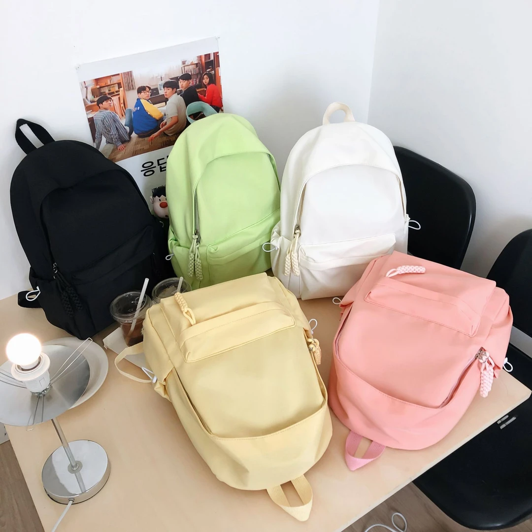 纯色净版双肩包新款潮酷中大学生书包轻便百搭女生出游上课背包潮