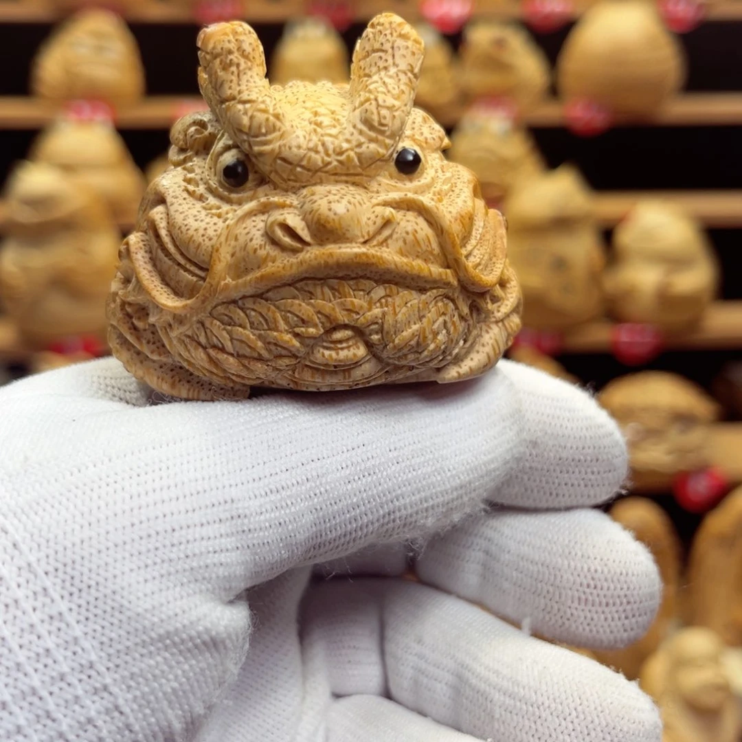 竹A****扬竹根雕金蟾手把件