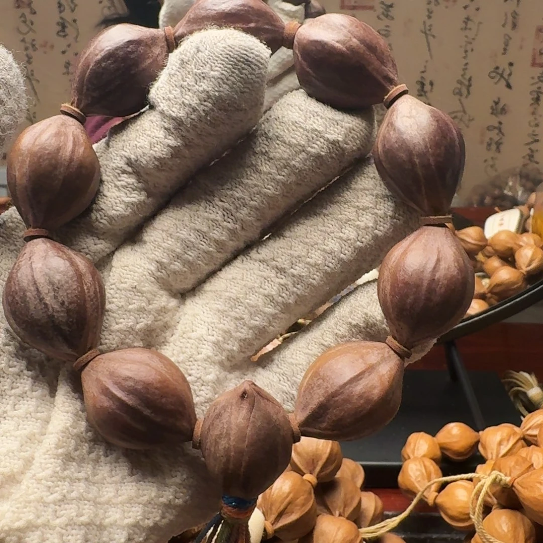 香***香橄榄核把件紫皮核