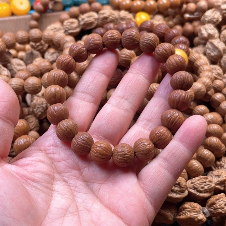 猴头核桃手串1.2小风羽自然泛油