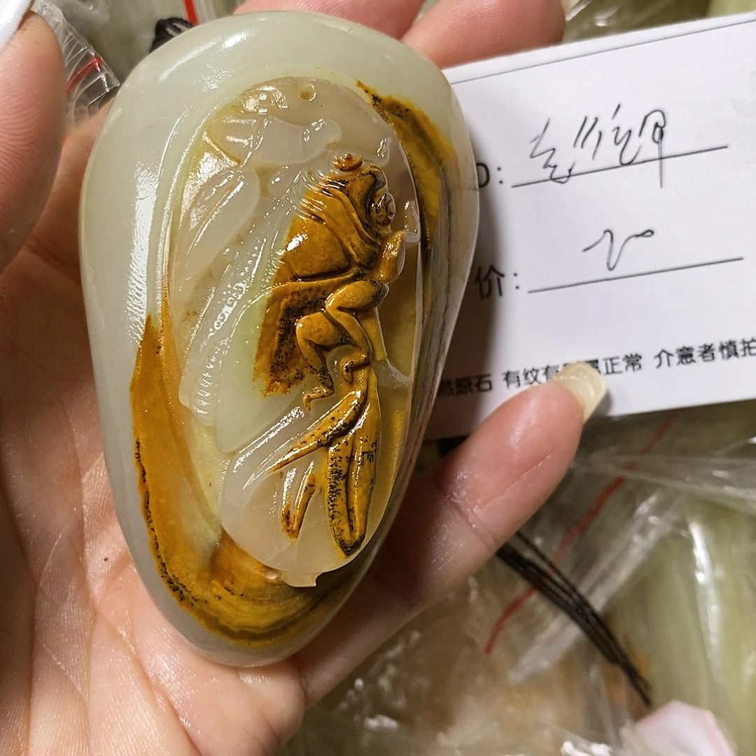 石材彭*军古青石手把件