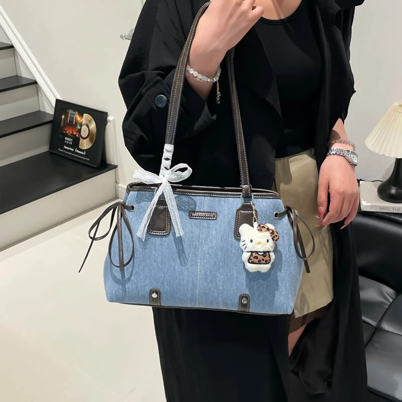 休闲大容量牛仔布包包2025新款通勤女士单肩腋下包外出手提托特包