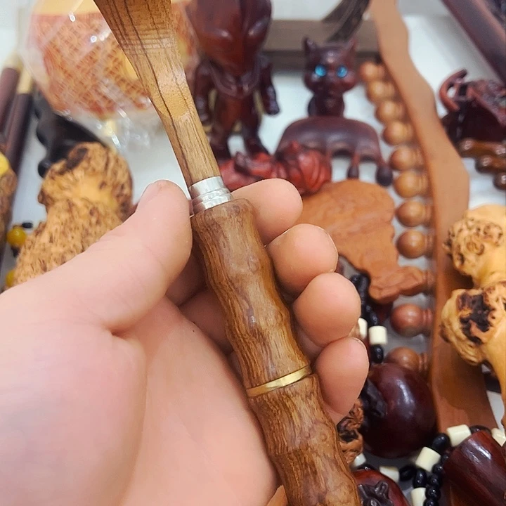 香榧木红瑰宝痒痒挠。伸缩