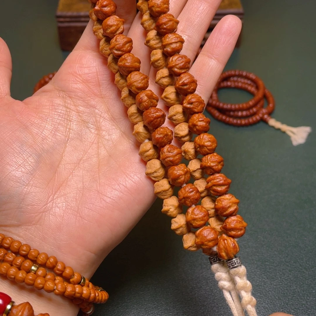 柏香籽/百香籽吊坠白牙横打手持